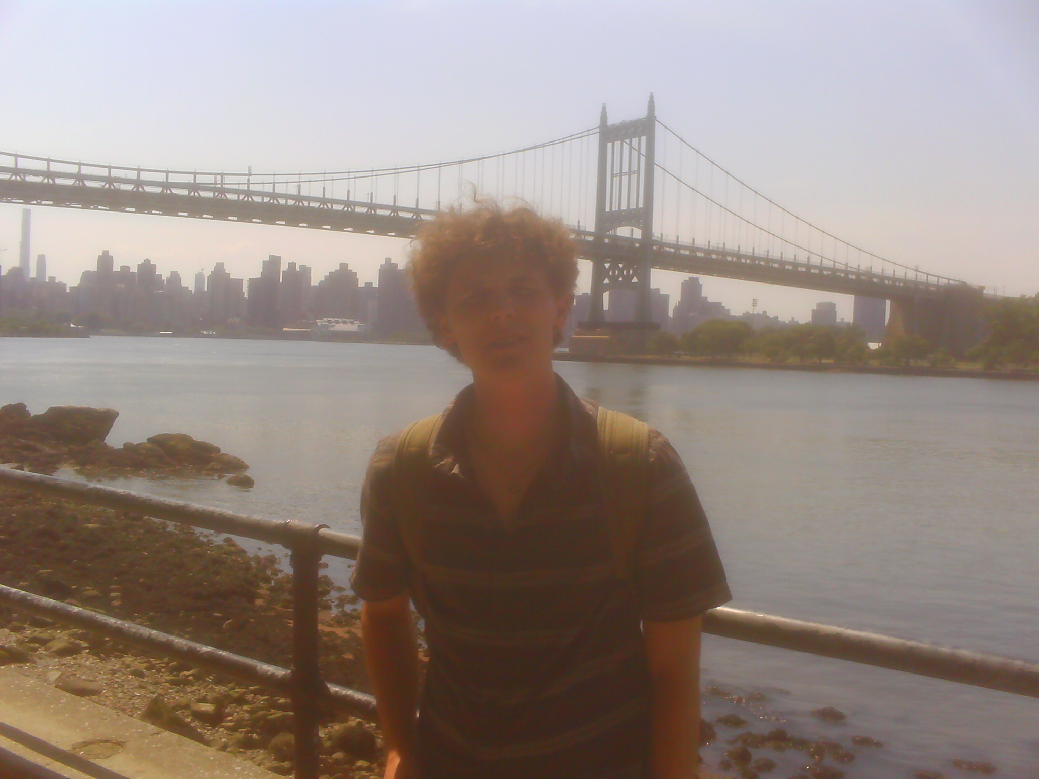 MBW in front of a bridge.